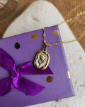 Collier pendentif médaille rose