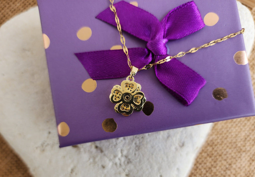 Collier pendentif trèfle tournant