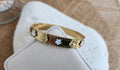 Bracelet jonc fleurs blanches