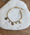 Bracelet chaîne à breloques médaille