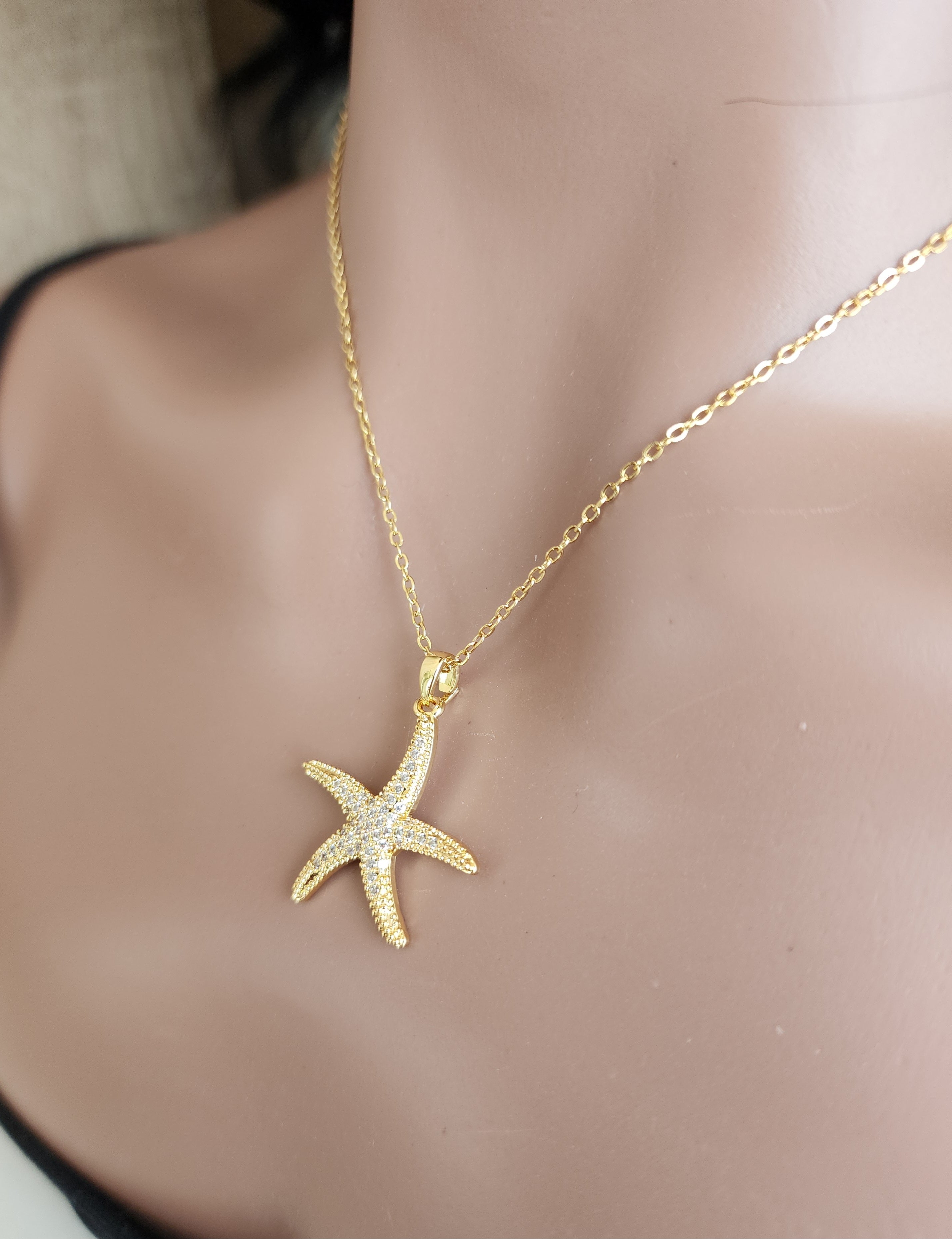 Collier pendentif étoile de mer strass