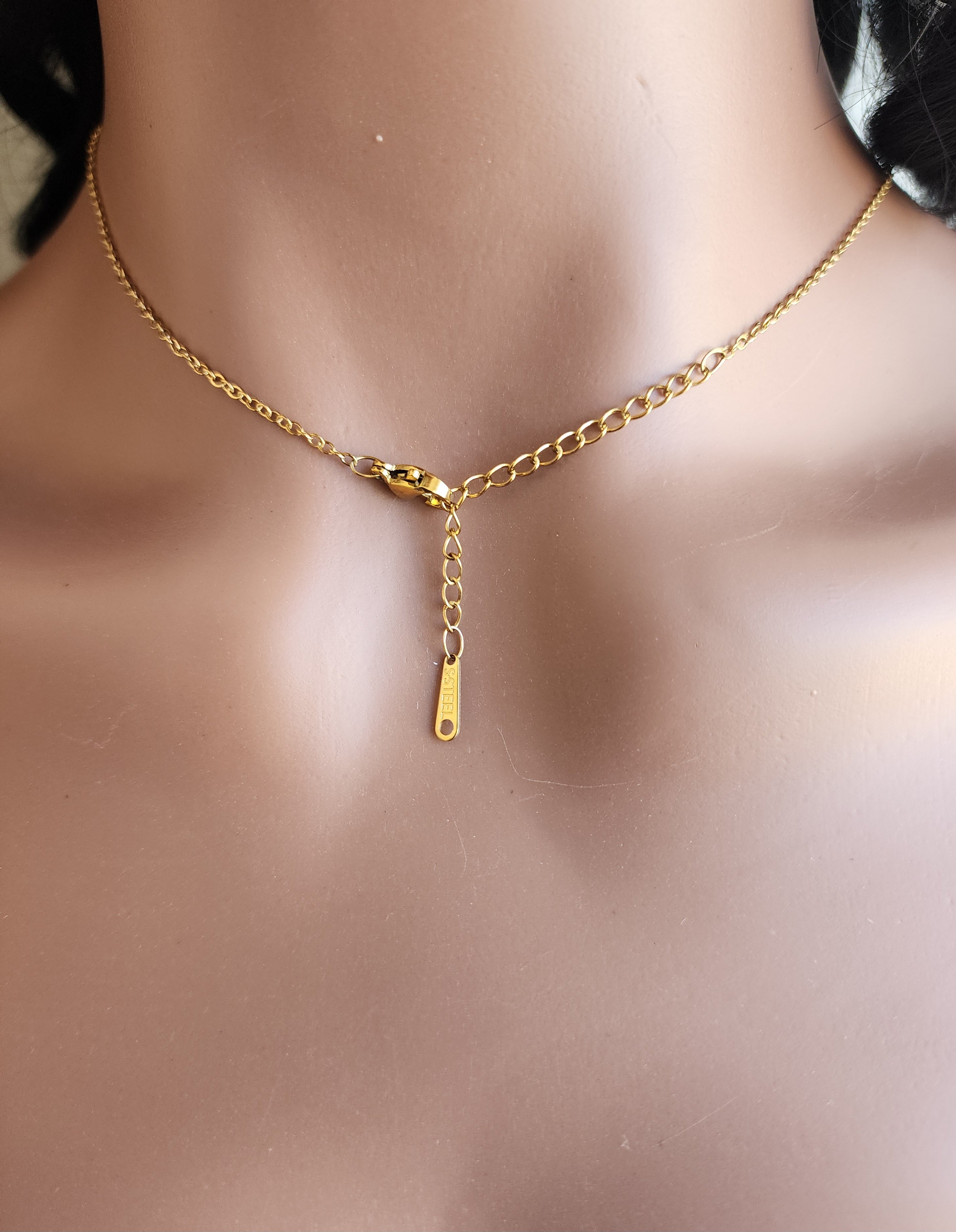 Collier pendentif soleil spirale