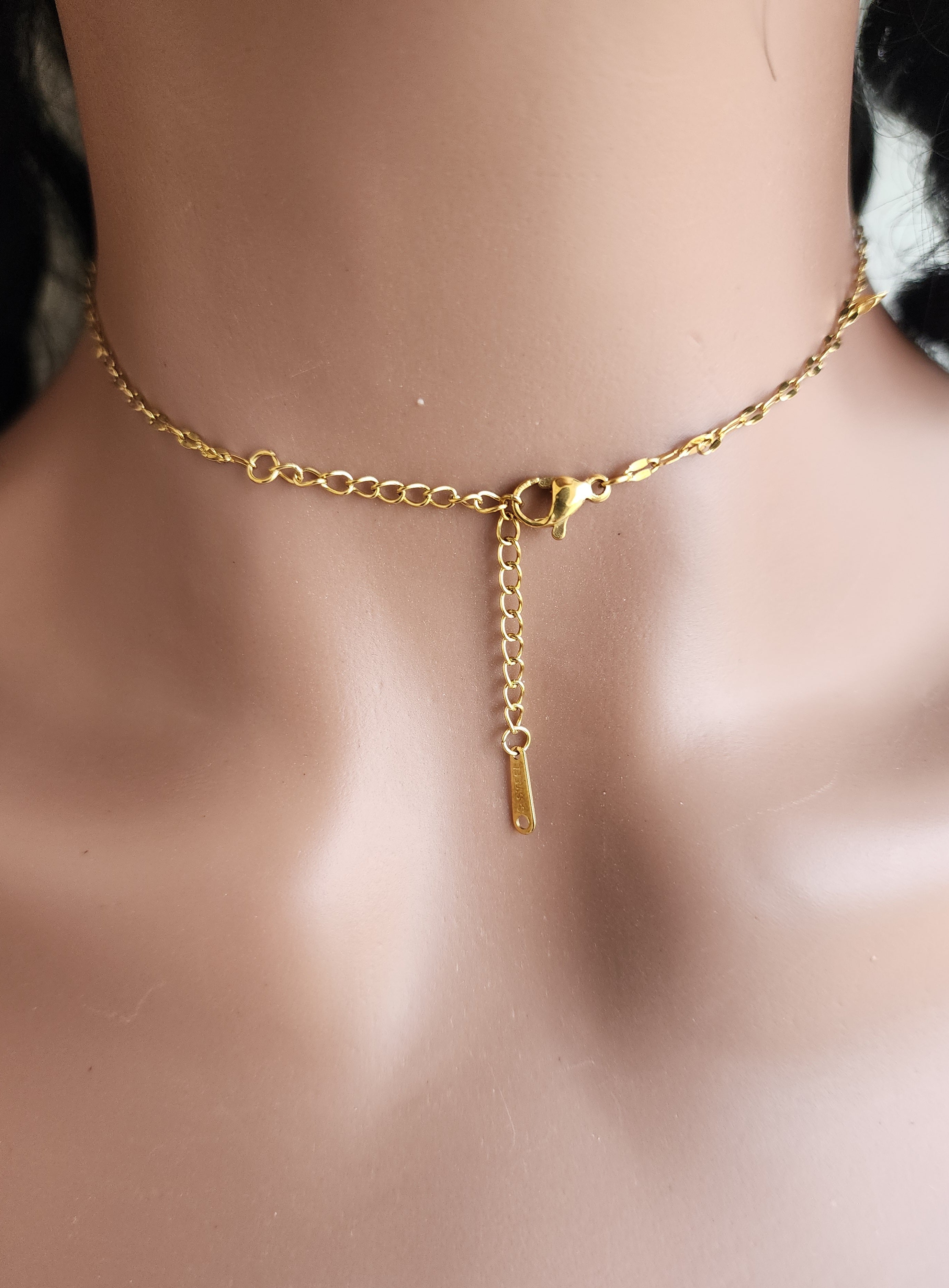 Collier pendentif trèfle tournant