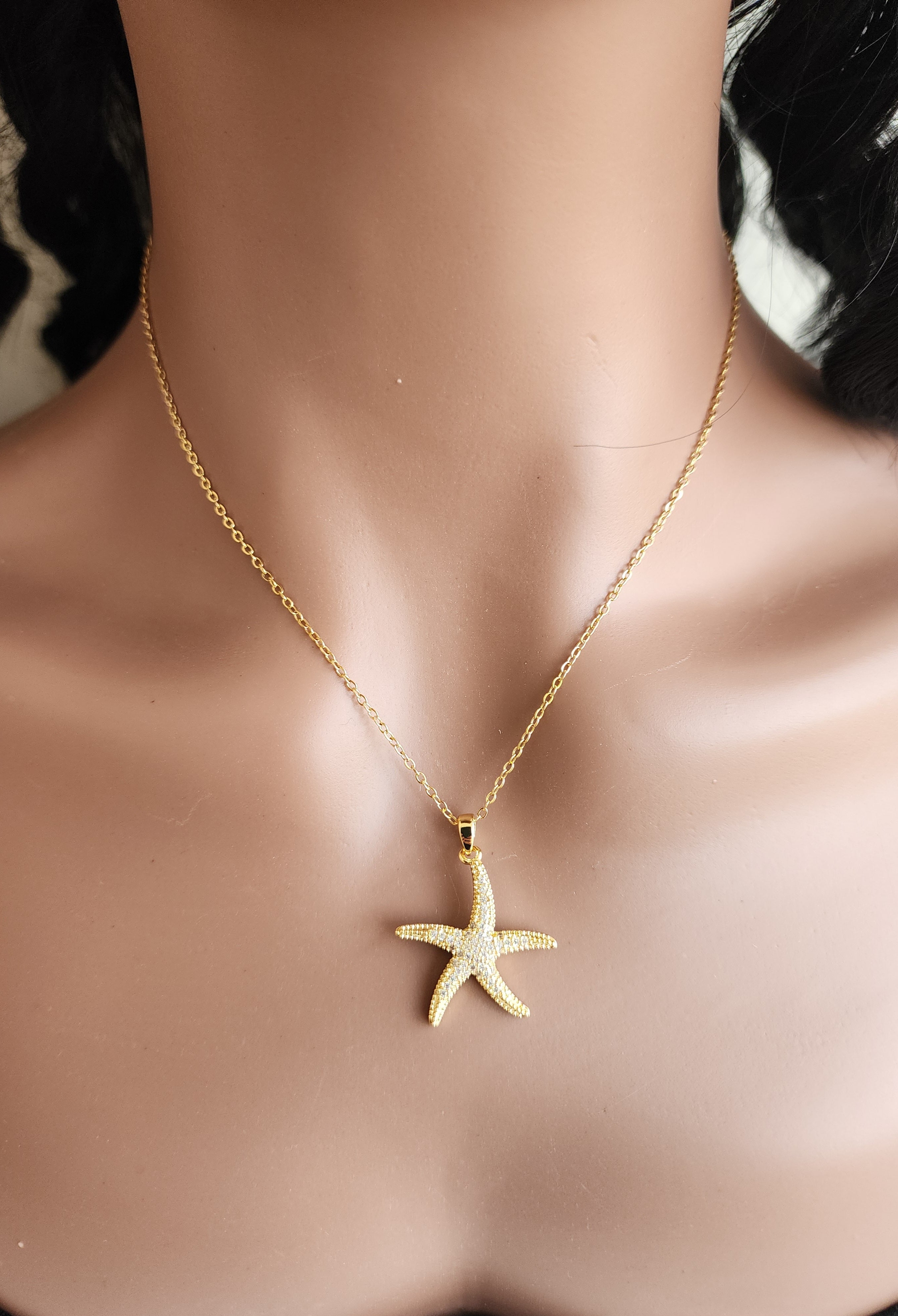 Collier pendentif étoile de mer strass